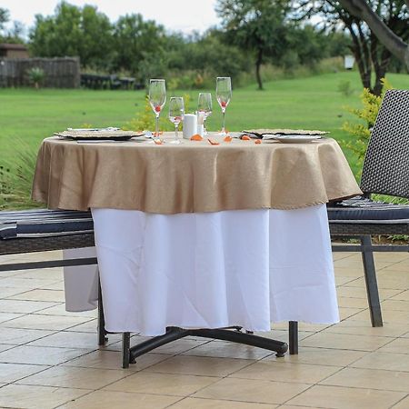 Royal Marang Hotel Phokeng Екстер'єр фото A table with a tablecloth